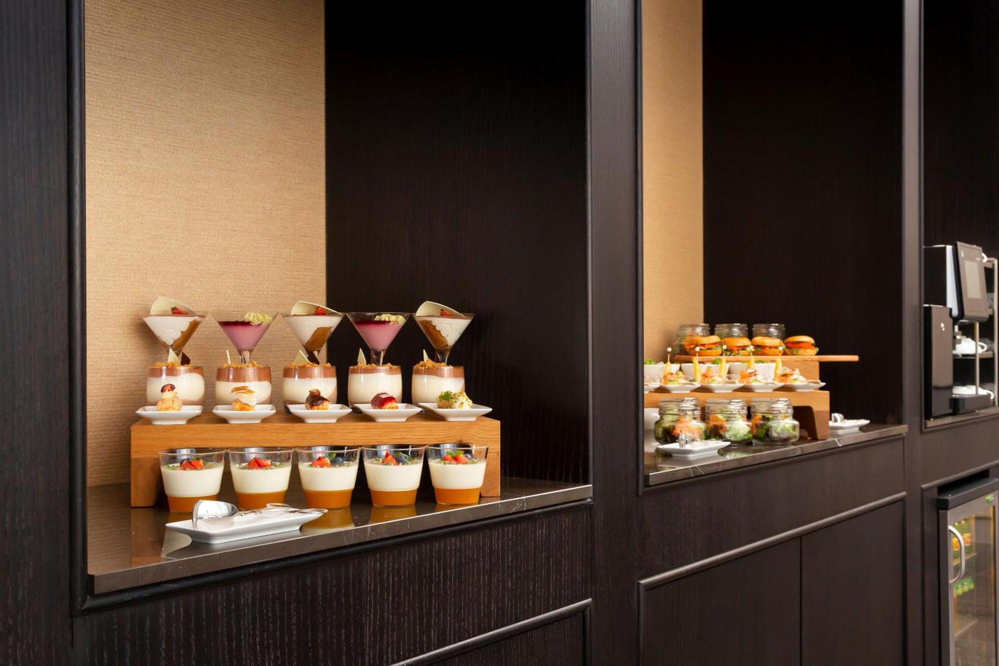 Sheraton Astana Hotel Exterior photo A dessert buffet